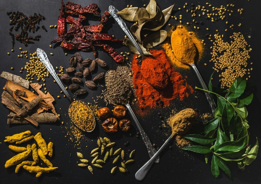 a table topped with different types of spices